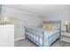 Bedroom with a metal bed frame and blue bedding at 6001-1424 S Kings Hwy., Myrtle Beach, SC 29575