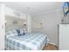 Bedroom with a bed, storage, and beachy decor at 6001-1424 S Kings Hwy., Myrtle Beach, SC 29575