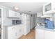 Bright kitchen featuring white cabinets and appliances at 6001-1424 S Kings Hwy., Myrtle Beach, SC 29575