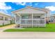 Quaint beach cottage with a welcoming front porch at 6001-1424 S Kings Hwy., Myrtle Beach, SC 29575