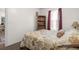 Simple bedroom with a double bed, wooden bookcase and window at 6001 - 5238 S Kings Hwy., Myrtle Beach, SC 29575