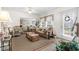 Cozy living room features a sofa, coffee table, and access to a dining area at 6001 - 5238 S Kings Hwy., Myrtle Beach, SC 29575