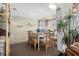 Bright dining room with a table and chairs, beach-themed decor at 6001 - 5238 S Kings Hwy., Myrtle Beach, SC 29575