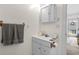 Small bathroom with single sink vanity, medicine cabinet, and shower at 6001 - 5238 S Kings Hwy., Myrtle Beach, SC 29575