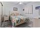 Bedroom with floral bedding and a calm atmosphere at 5905 S Kings Highway # 416-B, Myrtle Beach, SC 29575