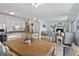 Bright dining area with views into the living room and kitchen at 5905 S Kings Highway # 416-B, Myrtle Beach, SC 29575