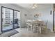 Dining area with table and chairs, and balcony access at 5905 S Kings Highway # 416-B, Myrtle Beach, SC 29575