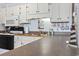 Kitchen with white cabinets and a dark countertop at 5905 S Kings Highway # 416-B, Myrtle Beach, SC 29575