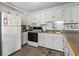 Cozy kitchen with white cabinets and a charming decor at 5905 S Kings Highway # 416-B, Myrtle Beach, SC 29575