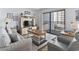 Bright living room featuring comfortable seating and a balcony at 5905 S Kings Highway # 416-B, Myrtle Beach, SC 29575