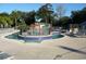 Community pool with a separate kiddie pool and lounge chairs at 5905 S Kings Highway # 416-B, Myrtle Beach, SC 29575