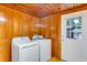 Laundry room with washer, dryer, and exterior access at 7122 Cox Lake Dr., Mullins, SC 29574