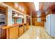 Kitchen with island and open concept to living room at 7122 Cox Lake Dr., Mullins, SC 29574