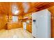 Kitchen with white appliances and wood cabinets at 7122 Cox Lake Dr., Mullins, SC 29574