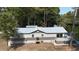 Aerial view of house, deck, and riverfront property at 7122 Cox Lake Dr., Mullins, SC 29574