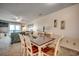 Bright dining area with table and chairs, offering a casual space for meals at 415 N Ocean Blvd. # 302, Surfside Beach, SC 29575