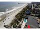 Aerial view of oceanfront property with pool, close to beach at 415 N Ocean Blvd. # 302, Surfside Beach, SC 29575