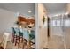Kitchen with breakfast bar and view of hallway at 415 N Ocean Blvd. # 302, Surfside Beach, SC 29575