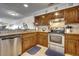 Kitchen with granite counters and island at 415 N Ocean Blvd. # 302, Surfside Beach, SC 29575