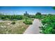 Wooden boardwalk leads to sandy beach with ocean views at 415 N Ocean Blvd. # 302, Surfside Beach, SC 29575