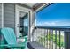 Oceanfront balcony with a chair and view of the beach at 415 N Ocean Blvd. # 302, Surfside Beach, SC 29575