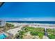 Stunning aerial view of beach, boardwalk, and community pool at 415 N Ocean Blvd. # 302, Surfside Beach, SC 29575