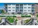 Building exterior showcasing pool and pathway to beach at 415 N Ocean Blvd. # 302, Surfside Beach, SC 29575