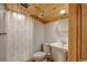 Simple bathroom with a shower and pedestal sink at 7018 Cox Lake Ct., Mullins, SC 29574