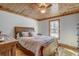 Spacious bedroom with wood floors and a wood ceiling at 7018 Cox Lake Ct., Mullins, SC 29574