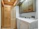 Convenient laundry room with washer, dryer, and cabinets at 7018 Cox Lake Ct., Mullins, SC 29574