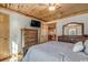 Bright bedroom with wood floors and a dresser at 7018 Cox Lake Ct., Mullins, SC 29574