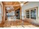 Spacious living room with hardwood floors and stone fireplace at 7018 Cox Lake Ct., Mullins, SC 29574