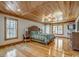 Large main bedroom with wood floors and a view at 7018 Cox Lake Ct., Mullins, SC 29574
