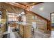 Large kitchen island with granite countertops and stainless steel appliances at 7018 Cox Lake Ct., Mullins, SC 29574