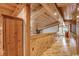 Upstairs hallway with wood floors and wood walls at 7018 Cox Lake Ct., Mullins, SC 29574