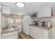 Efficient kitchen featuring white cabinets and ample counter space at 6001-1359 S Kings Hwy., Myrtle Beach, SC 29575