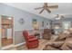 Bright living room with two comfy recliners and a view into the kitchen at 6001-1359 S Kings Hwy., Myrtle Beach, SC 29575