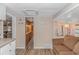 Functional kitchen with white cabinets and a view into the living area at 6001-1359 S Kings Hwy., Myrtle Beach, SC 29575