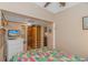 Spacious bedroom with a dresser and access to a shared closet at 6001-1359 S Kings Hwy., Myrtle Beach, SC 29575