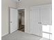 Bright bedroom with carpet flooring, double closets, and access to hallway at 3022 Deerberry Place, Longs, SC 29568