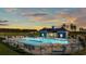 Community pool with a clubhouse and plenty of lounge chairs at 3022 Deerberry Place, Longs, SC 29568