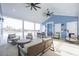 Covered patio with seating and a view of the community pool at 3022 Deerberry Place, Longs, SC 29568