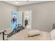 Bright bedroom with a view of a bathroom and sitting area at 949 Jackline Place # 103, Murrells Inlet, SC 29576