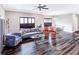Open concept living room with hardwood floors and comfy seating at 949 Jackline Place # 103, Murrells Inlet, SC 29576