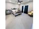 Bedroom with a queen-size bed and a ceiling fan at 949 Jackline Place # 103, Murrells Inlet, SC 29576