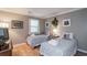 Bedroom with twin beds, featuring coastal-themed bedding and artwork at 366 Pinehurst Ln. # 13D, Pawleys Island, SC 29585