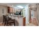 Kitchen with breakfast bar, stainless steel appliances, and granite countertops at 366 Pinehurst Ln. # 13D, Pawleys Island, SC 29585