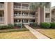 Attractive building exterior with landscaping at 366 Pinehurst Ln. # 13D, Pawleys Island, SC 29585