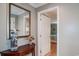 Bright entryway with a console table, mirror, and charming coastal decor at 366 Pinehurst Ln. # 13D, Pawleys Island, SC 29585