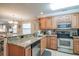 Well-equipped kitchen with stainless steel appliances and granite countertops at 366 Pinehurst Ln. # 13D, Pawleys Island, SC 29585